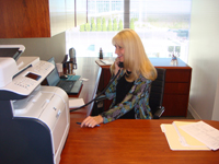 Debbie Brackett - Business Manager Hard at Work